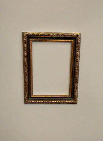 Ornate gold and brown rectangular picture frame.