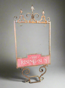 'The Rising Sun' antique metal swing sign holder with a decorative arrow head top.