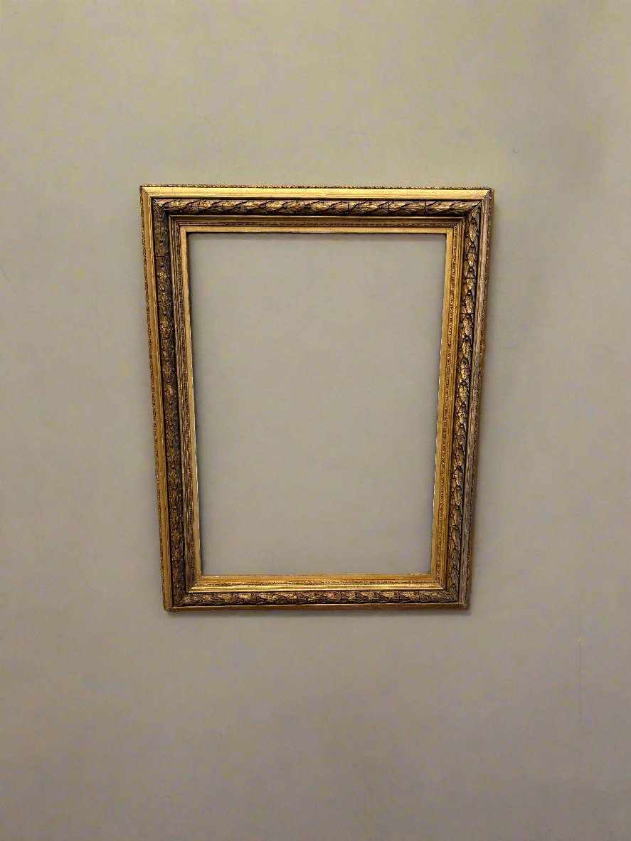 Renaissance style rectangular gold frame with a textured pattern.