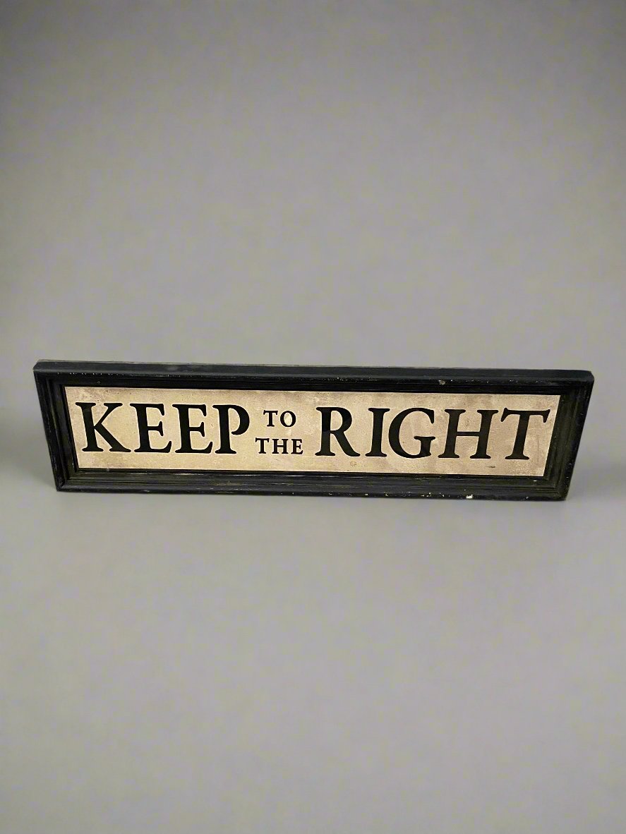 A pair of 'Keep To The Right' signs in a thick black frame.