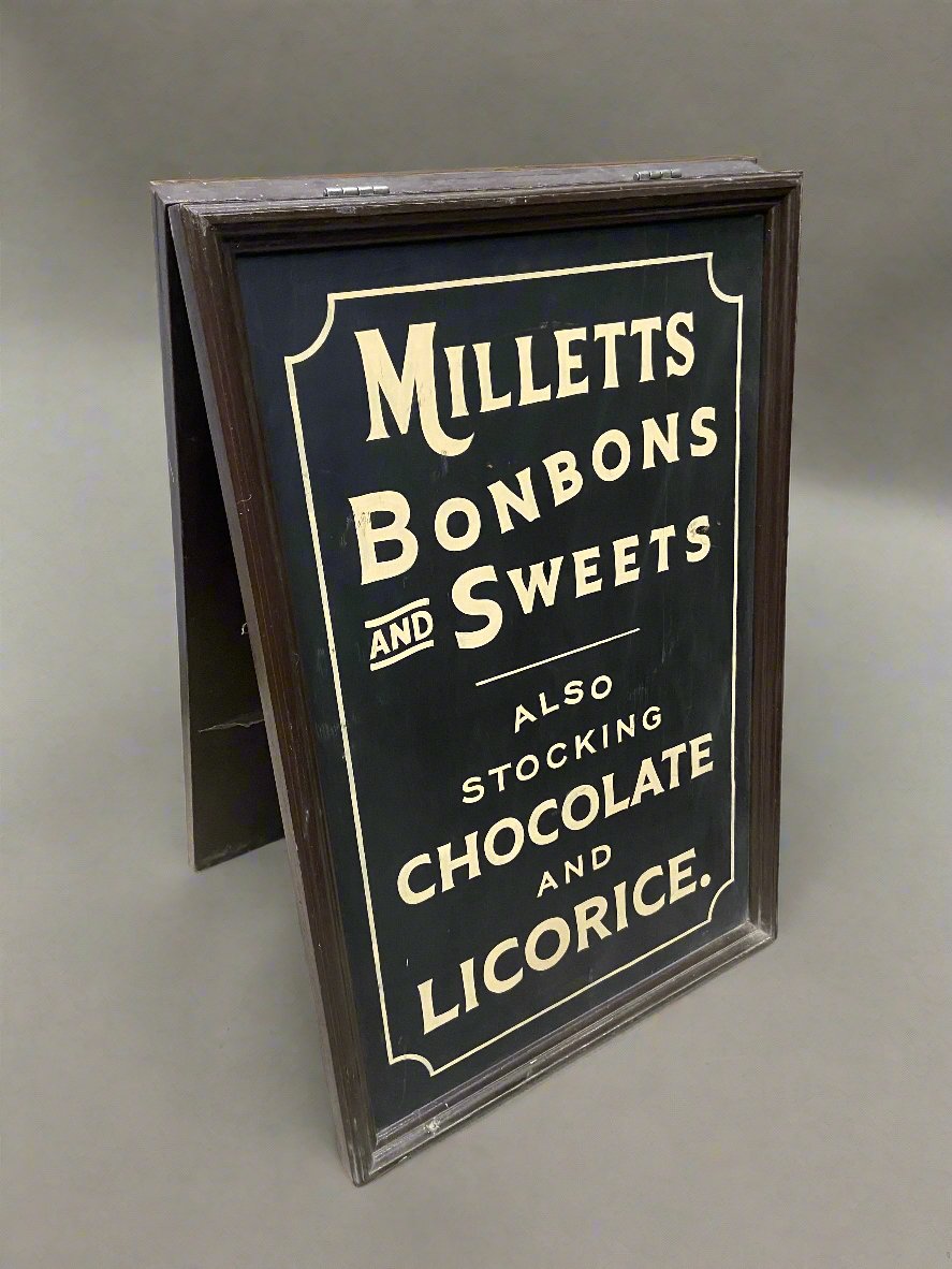 Millets 'Bon Bons and Sweets' traditional wooden A-frame shop sign.