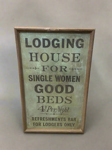 Large rectangular 'Lodging House for Single Women' sign.