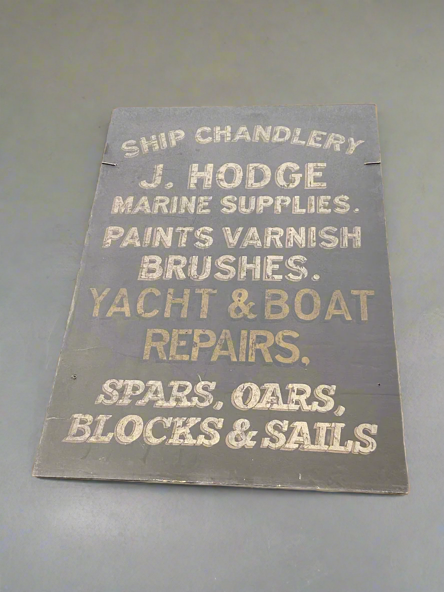 Large rectangular 'Ship Chandlery marine supplies' wall sign.