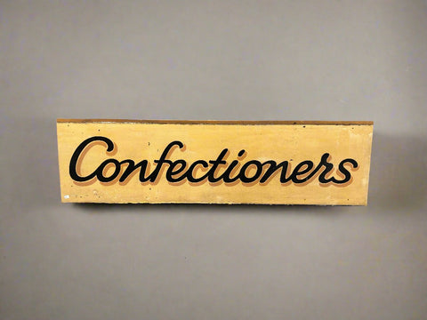 Wide Confectioners sign, hand painted on a wooden board in a traditional vintage style.