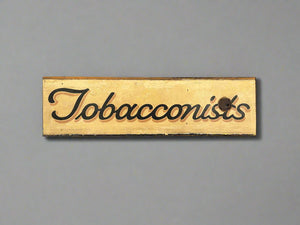 Long Tobacconists shop department signage, in a traditional hand painted style and aged condition.