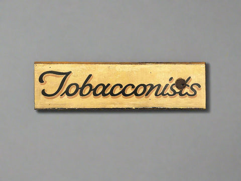 Long Tobacconists shop department signage, in a traditional hand painted style and aged condition.