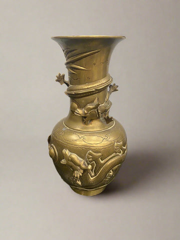 A matching pair of Oriental/ Chinese brass dragon vases. Circa 1900.