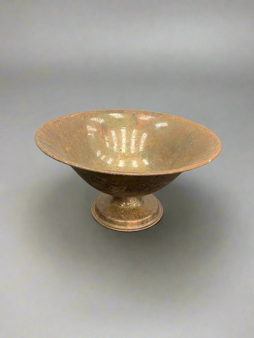 Decorative speckled fruit bowl with a glazed finish.