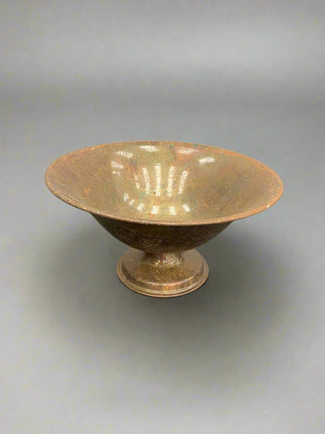 Decorative speckled fruit bowl with a glazed finish.