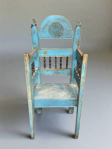 An Eastern European throne chair, with a chip carved rosette. Circa 1800s. Could also be an ideal dressing piece for an Eastern European orthodox church for a priest or bishop.