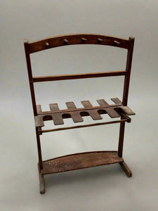 Antique Victorian mahogany boot and whip stand, circa 1850s. The slotted central board holds up to six pairs of boots; a suitable piece to dress a country house.