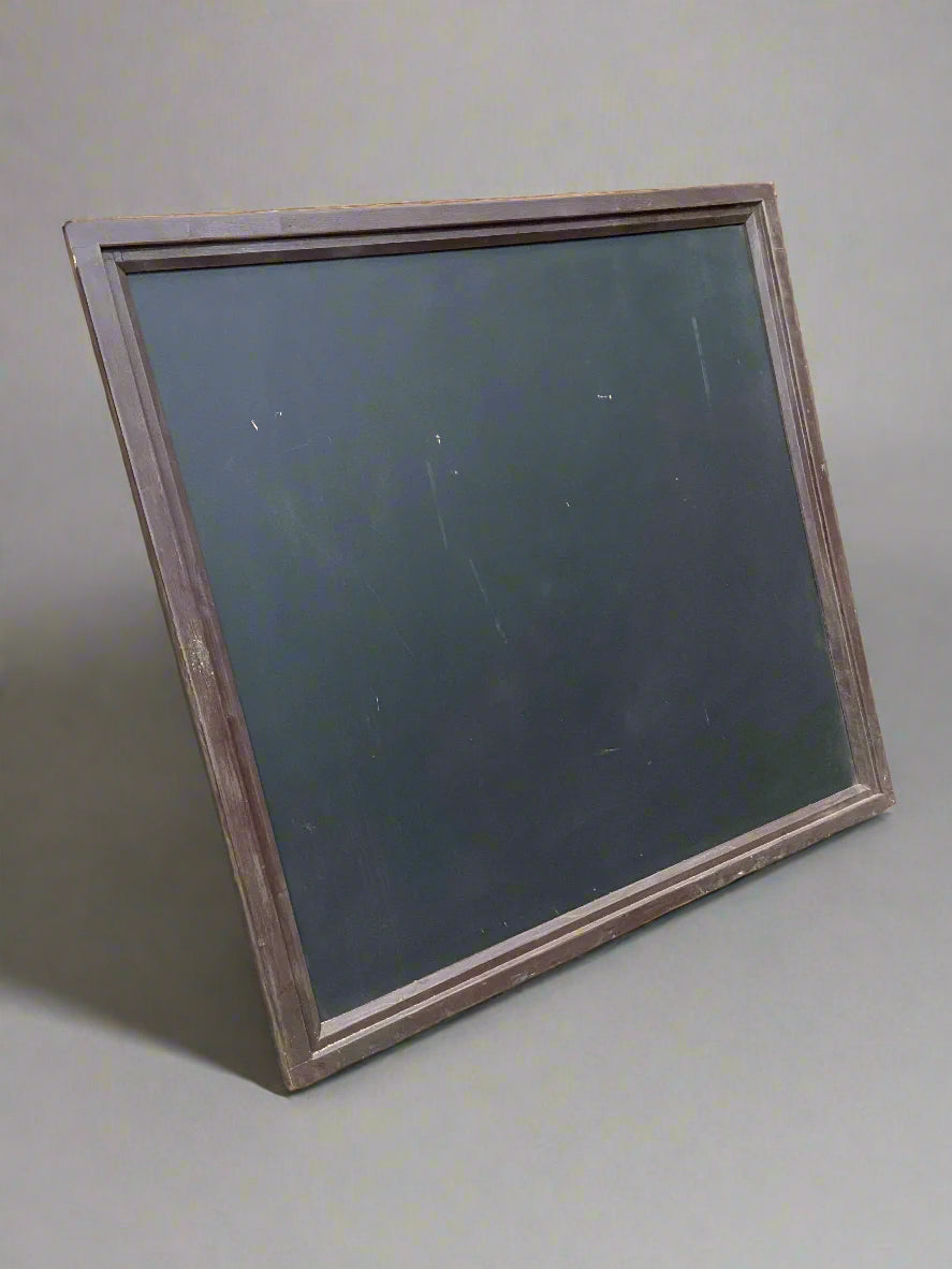 Large rectangular wooden framed blackboard.