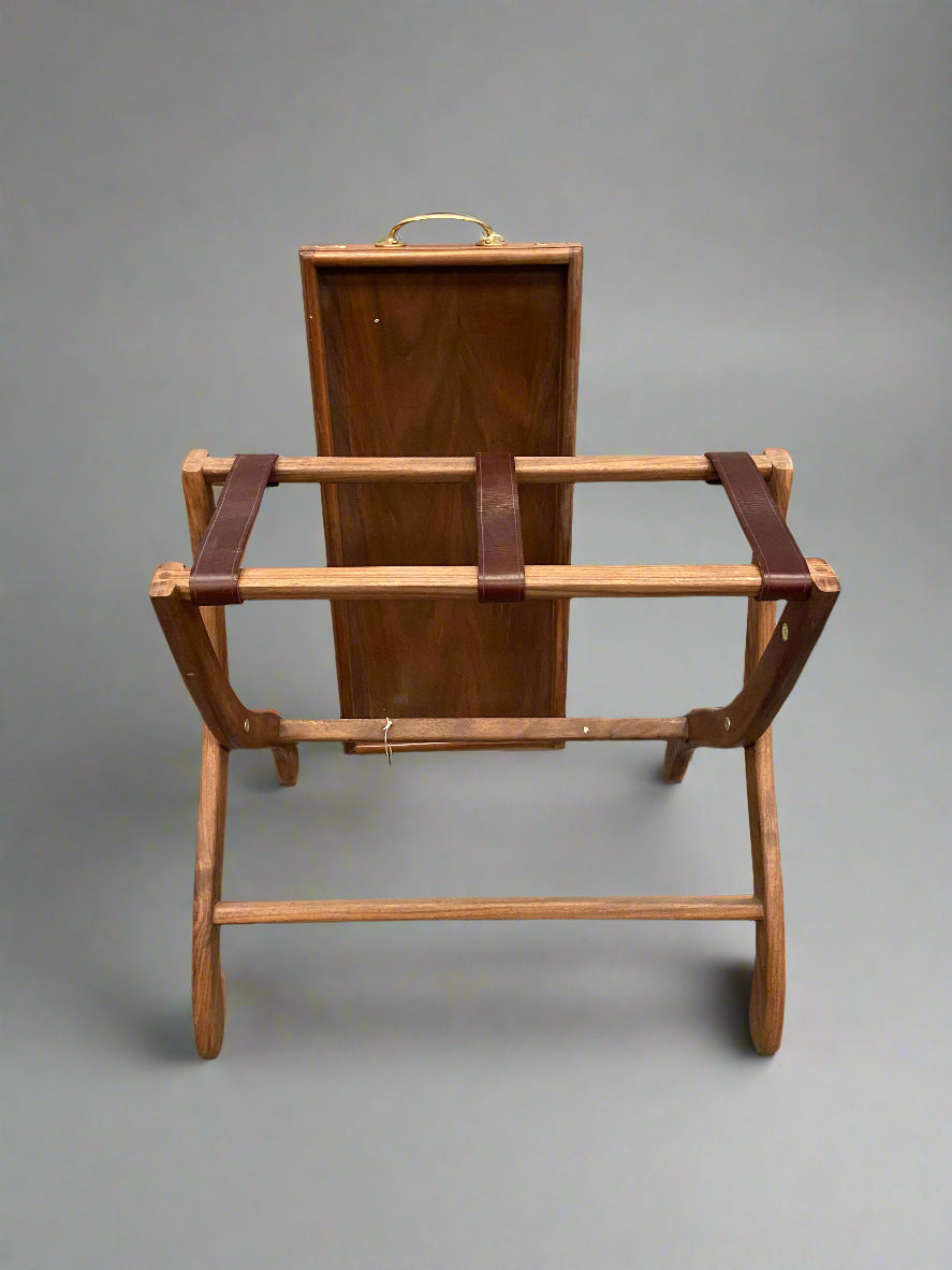 Antique wood and leather butler's serving stand with brass handles.