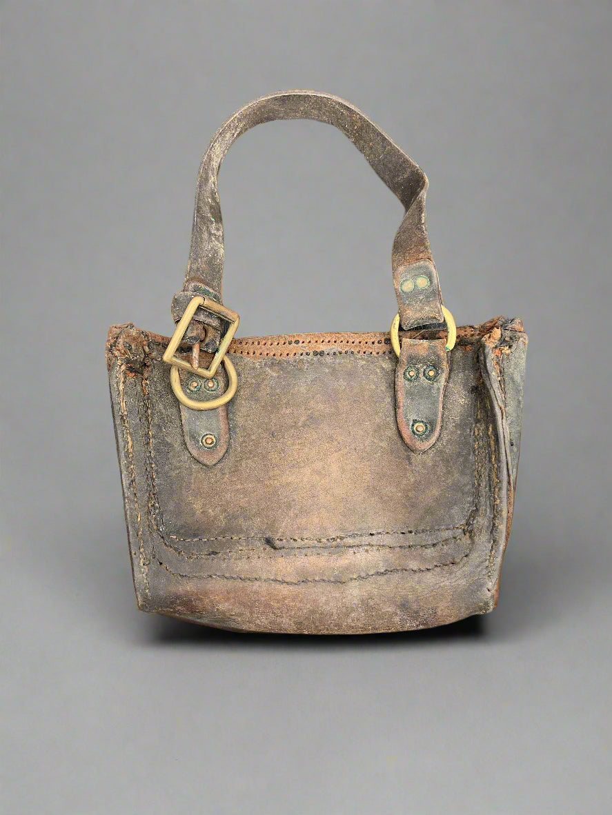 Small aged brown leather bag.