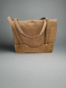 Classic vintage brown snakeskin handbag.