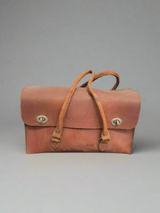 Vintage orange brown leather tool bag.