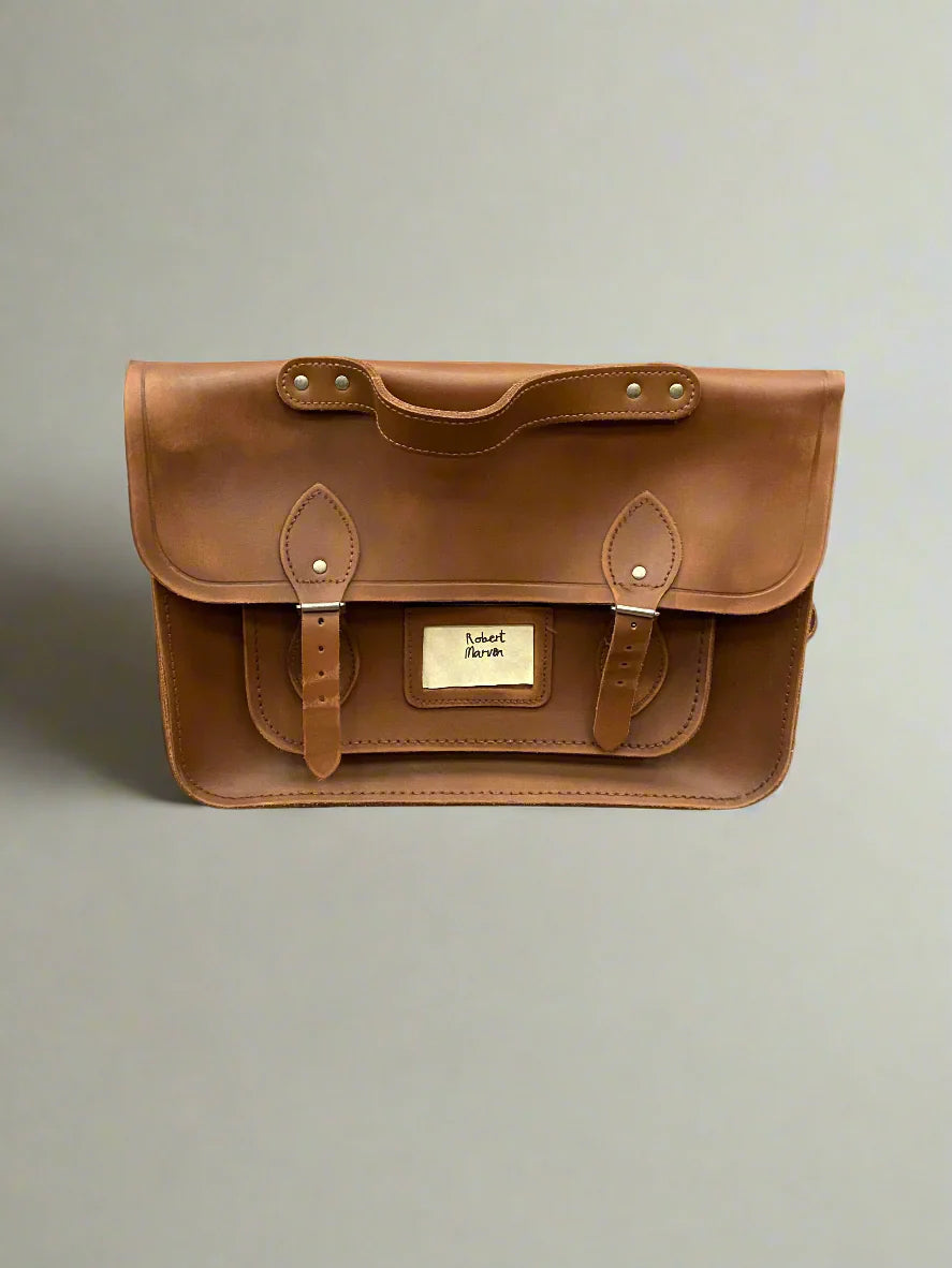 A large set of classic brown leather Cambridge satchels. Condition looks new.