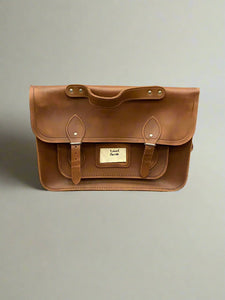 A large set of classic brown leather Cambridge satchels. Condition looks new.