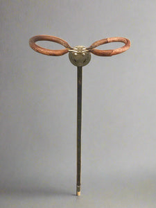 Antique metal shooting seat with a curved leather seat; could be Edwardian.