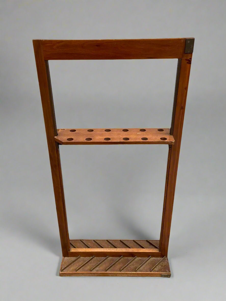 Antique wooden pool cue holder, circa 20th century.