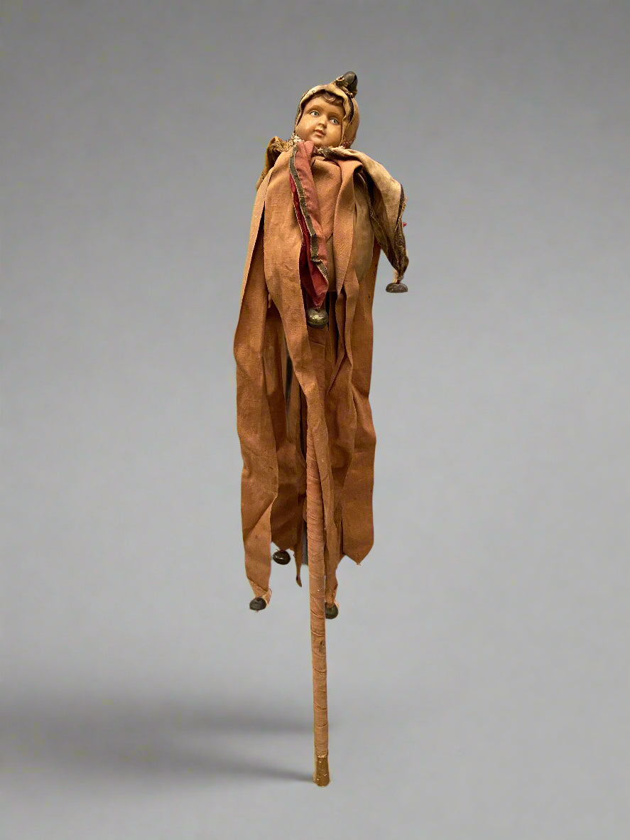 Medieval-style rag jester marotte doll, mounted on a stick with bells.