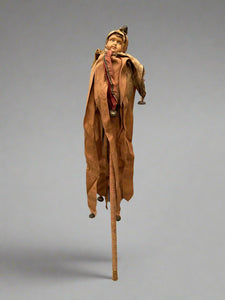 Medieval-style rag jester marotte doll, mounted on a stick with bells.