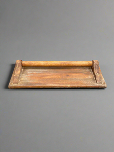 Vintage wooden wall-mounted towel rail. It could also be a utensil holder in the kitchen.