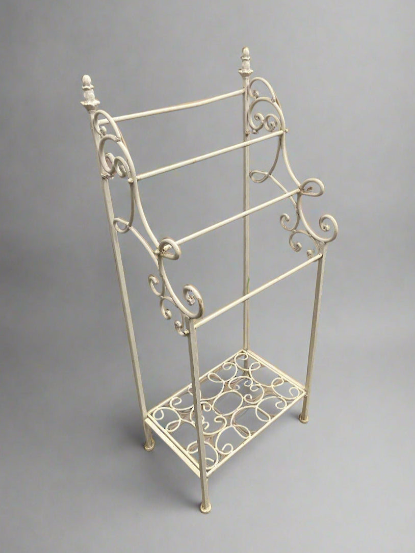 A matching pair of vintage, French, provincial-style towel racks.