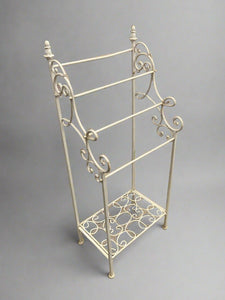 A matching pair of vintage, French, provincial-style towel racks.