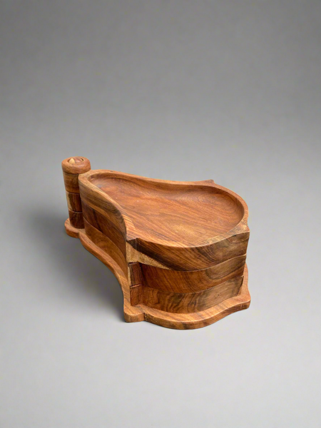 Teak wooden swivel stacking dishes/ aperitif trays, made in Egypt. Designed for displaying snacks and nibbles.