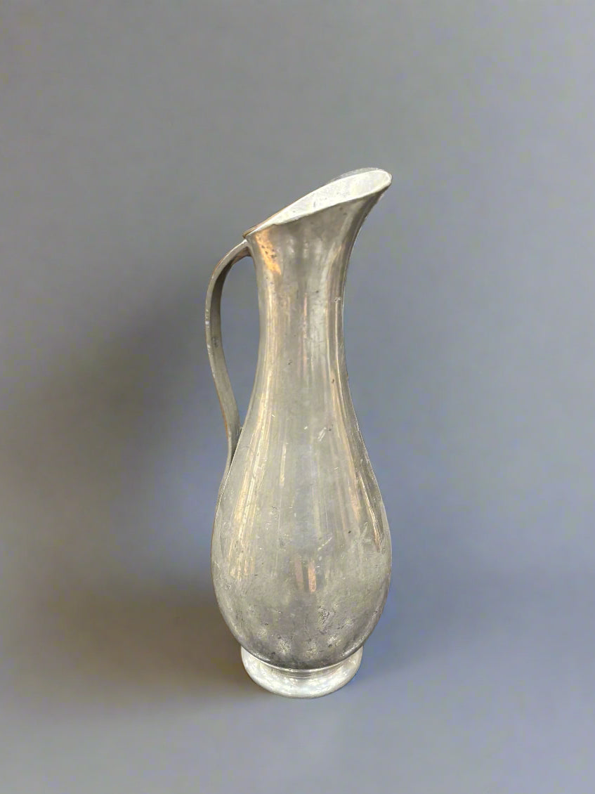 An elegant mid-century pewter pitcher, circa 1960s. It could be Royal Holland.