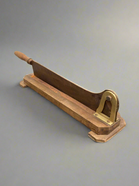 Antique guillotine-style bread and baguette cutter, circa 19th century.