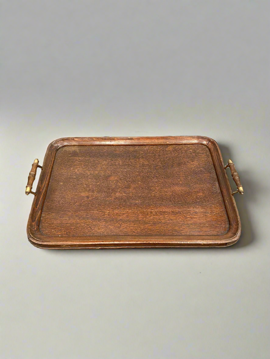 Antique, large, rectangular, oak serving tray with brass handles.