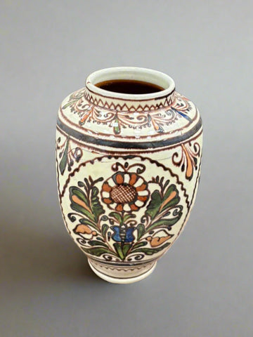 A Hungarian korond folk vase with hand painted floral patterns, circa 1960s/70s.