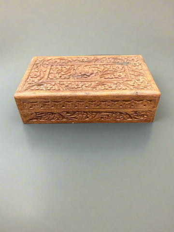 An Indian-style, floral, carved jewellery trinket box.