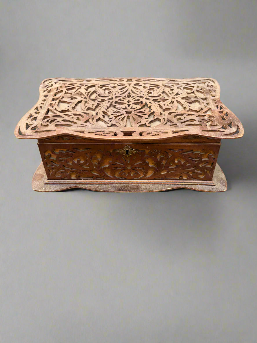 An antique wooden fretwork jewellery/sewing box, could be Victorian.