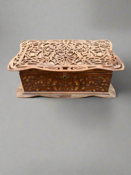 An antique wooden fretwork jewellery/sewing box, could be Victorian.