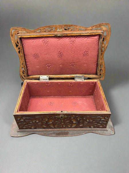 An antique wooden fretwork jewellery/sewing box, could be Victorian.