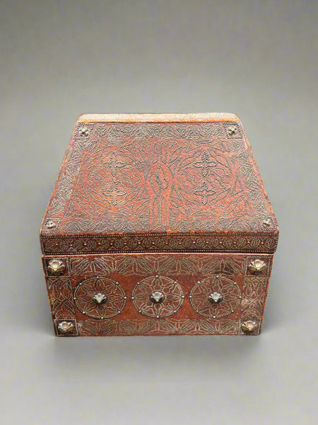 A studded manuscript storage box, could be Burmese. Lined with a yellow patterned fabric lining.