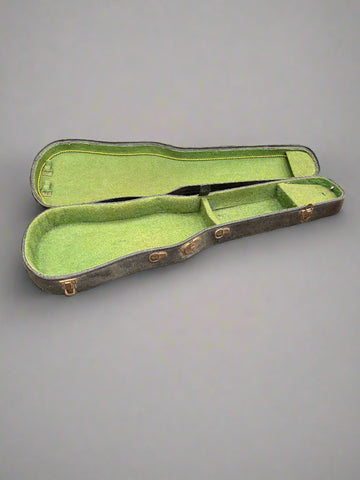 A traditional black violin case, lined with green felt.