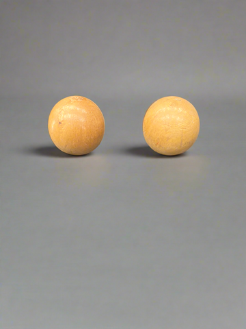 A pair of vintage wooden billiard/ skittle balls.
