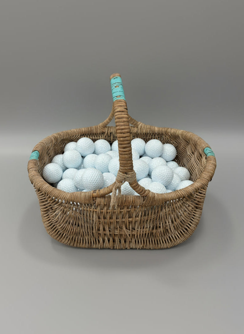 A collection of classic white golf balls.