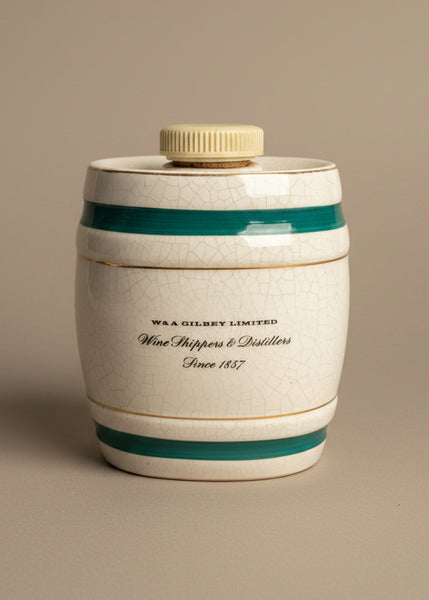 A ceramic sherry decanter in the shape of a barrel by Wade Royal Victoria Pottery. Circa 1940s.