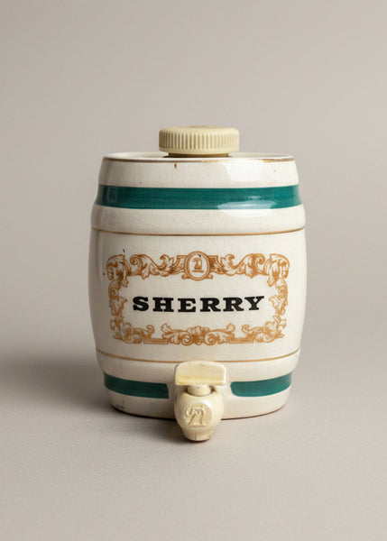 A ceramic sherry decanter in the shape of a barrel by Wade Royal Victoria Pottery. Circa 1940s.