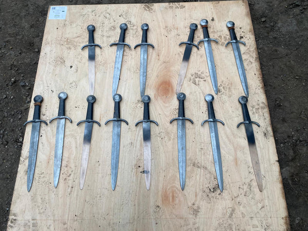 A Set of Daggers with Black Grips