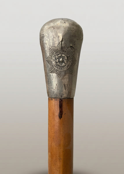 A collection of officer's wooden swagger sticks/ walking canes with silver mounts.