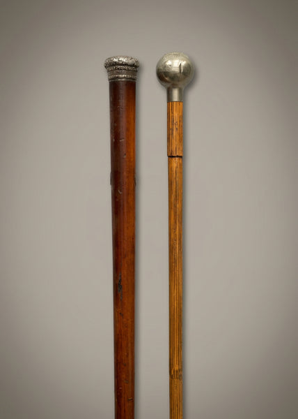 A collection of officer's wooden swagger sticks/ walking canes with silver mounts.