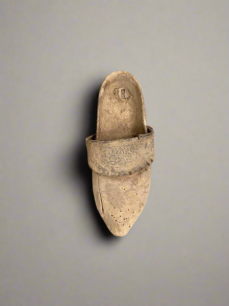 A Collection of Aged Wooden Clogs