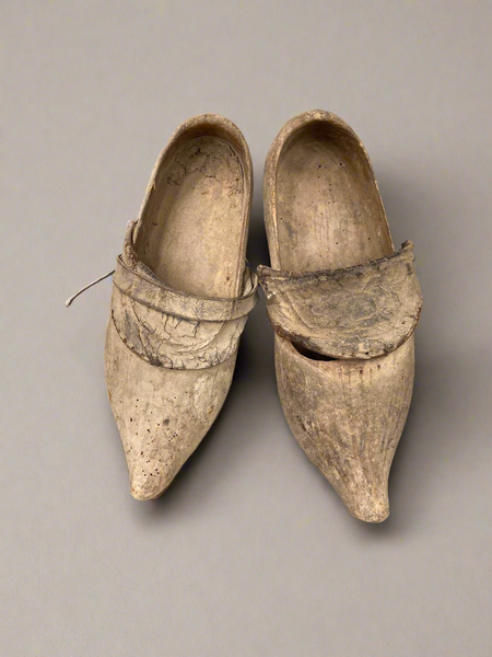 A Collection of Aged Wooden Clogs