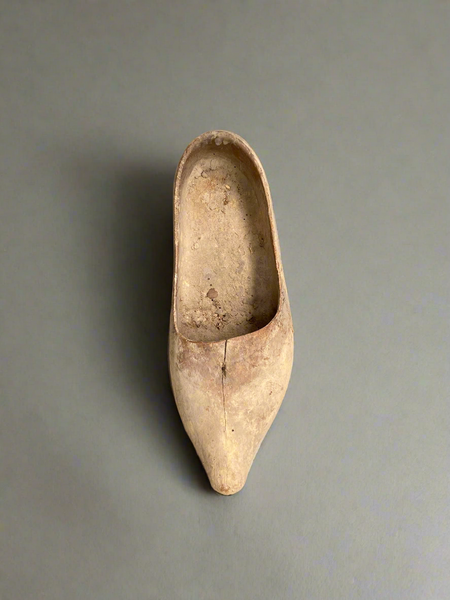 A Collection of Aged Wooden Clogs